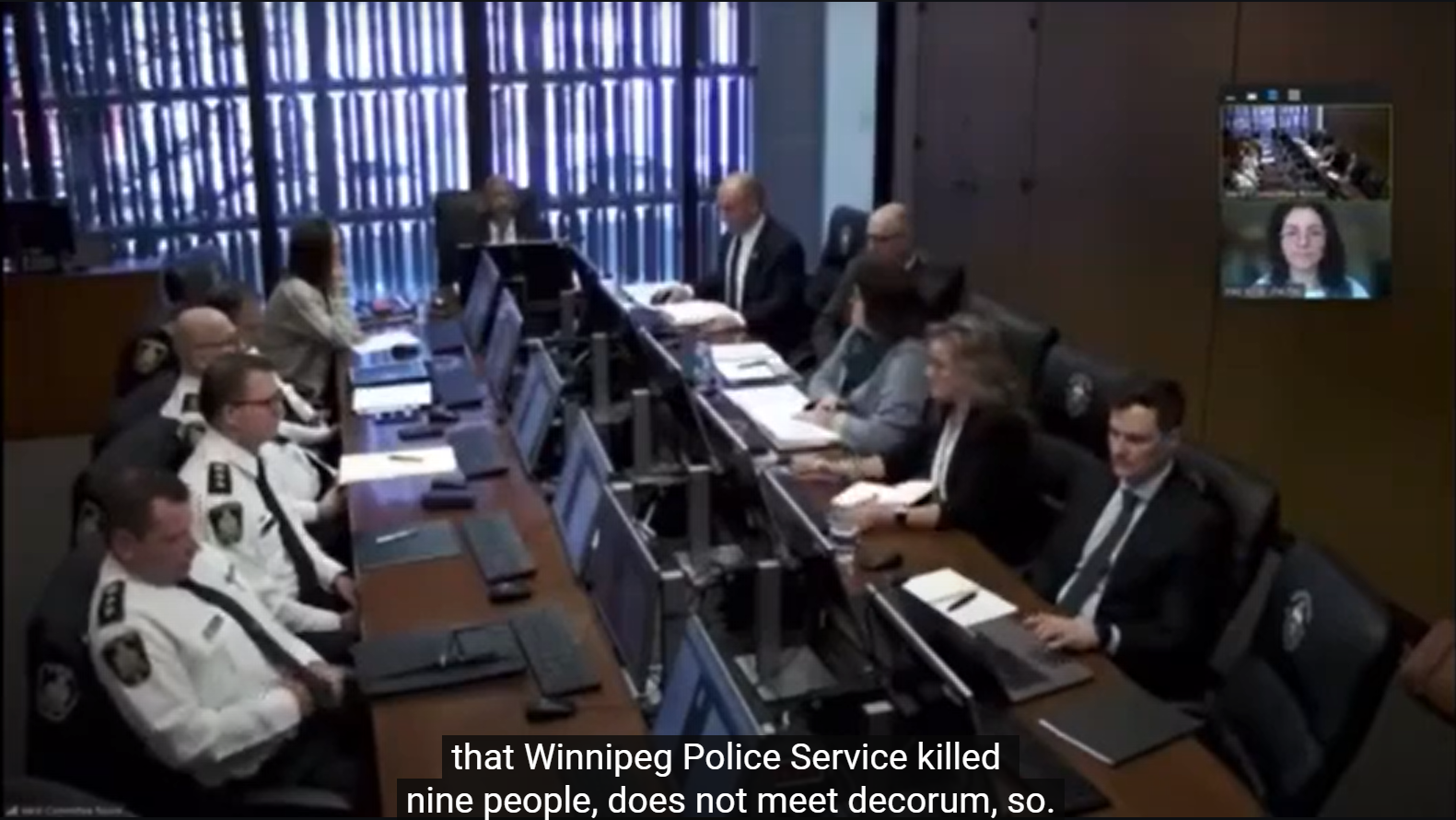 Screenshot of Winnipeg Police Board meeting. The caption reads "the WPS killed nine people, does not meet decorum"